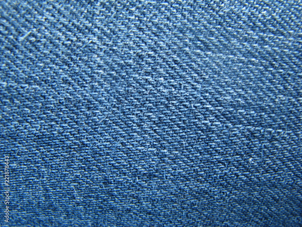 Blue denim texture on jeans Blue denim texture on jeans