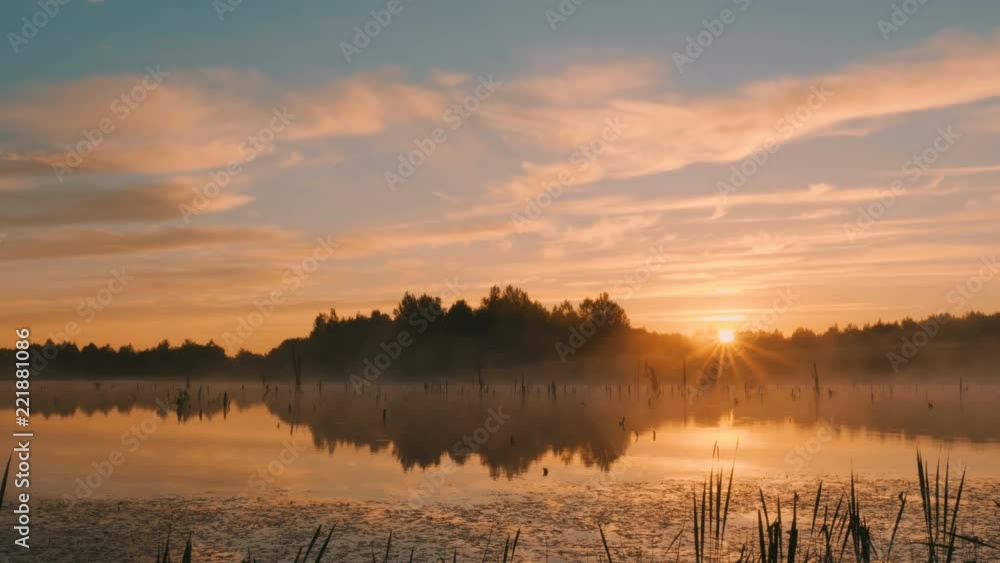 Misty morning sunrise on marsh Misty morning sunrise on marsh