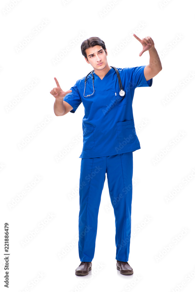 Young male doctor pressing buttons isolated on white Young male doctor pressing buttons isolated on white