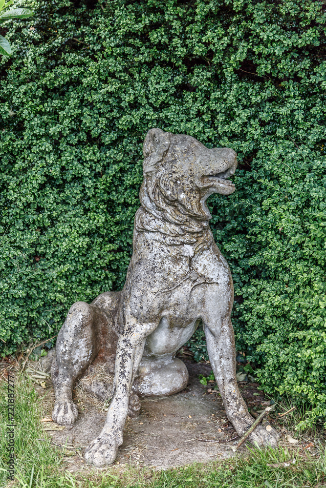 Sculpture of a dog in the middle of a garden of Blickling Hall Sculpture of a dog in the middle of a garden of Blickling Hall
