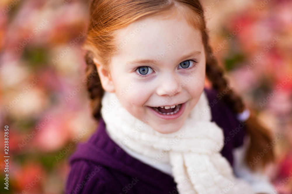 Happy Little Red-Haired Girl in Autumn Happy Little Red-Haired Girl in Autumn