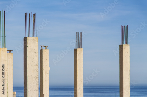 pouring of concrete against the blue sky