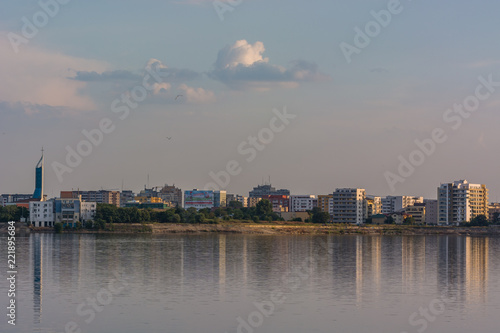 Beautiful Reflection of the City Near Sunset © LiviuConstantin