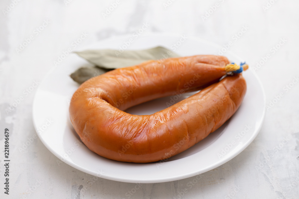 typical portuguese smoked sausage farinheira on white dish Stock Photo