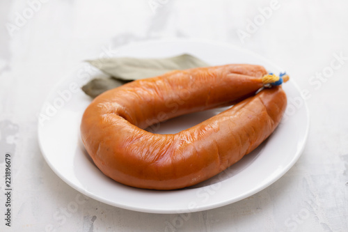 typical portuguese smoked sausage farinheira on white dish photo