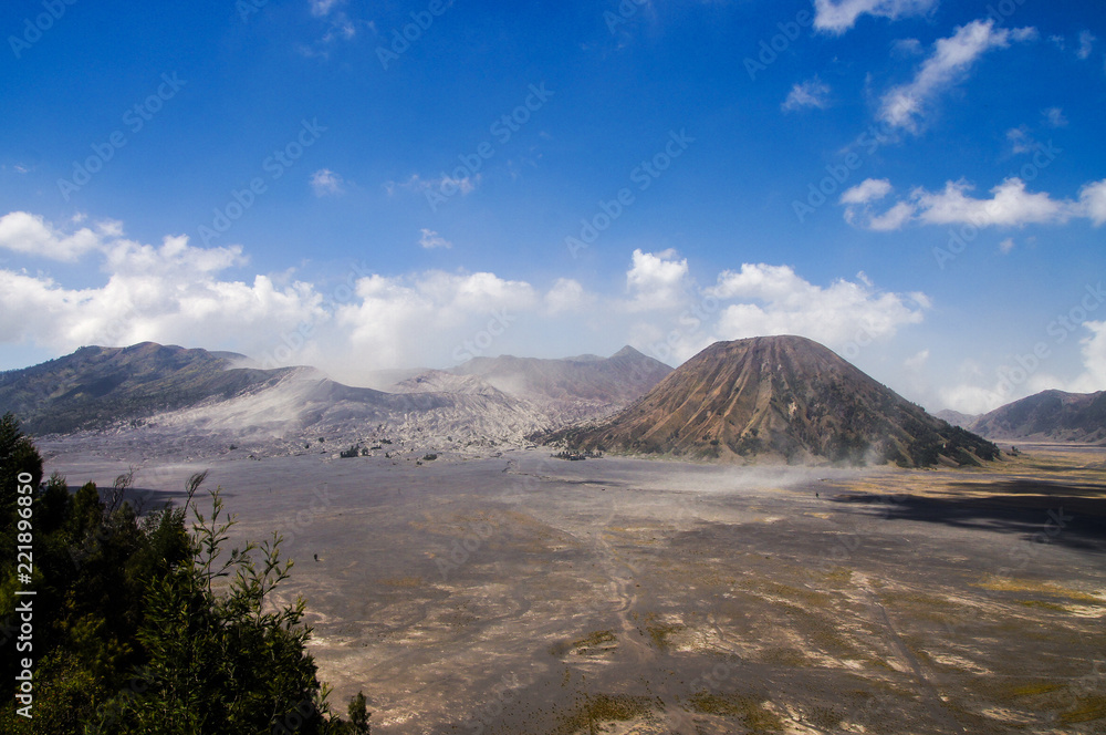 View on caldera of old volcano Tengger with Bromo and Batok volcanoes located there, Bromo Tengger Semeru National Park, East Java, Indonesia. View on caldera of old volcano Tengger with Bromo and Batok volcanoes located there, Bromo Tengger Semeru National Park, East Java, Indonesia.
