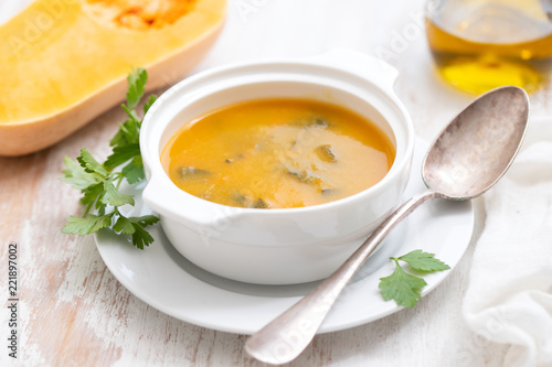 pumpkin soup in white bowl