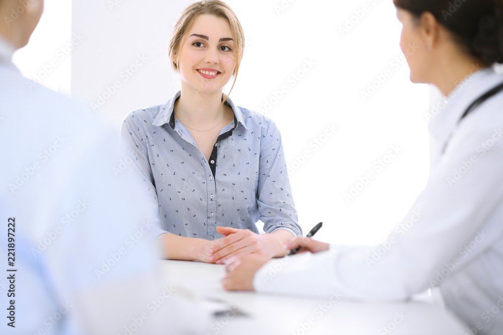 Doctor and patient at meeting. Medicine and health care concept Doctor and patient at meeting. Medicine and health care concept