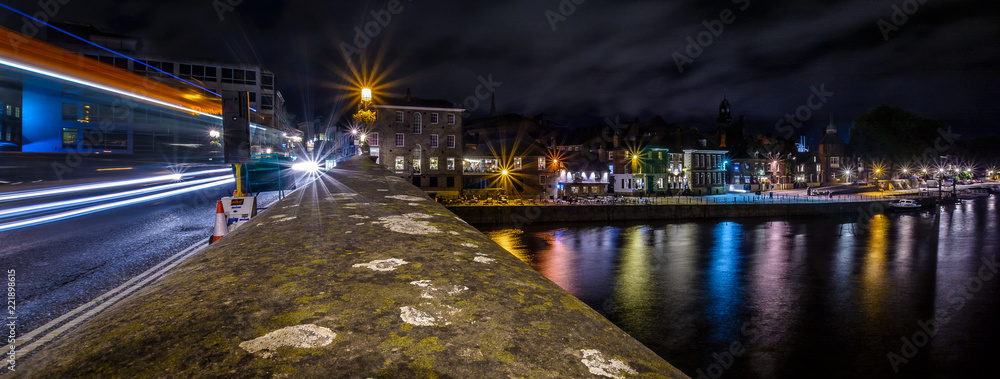 Obraz premium Long Exposure Night Time Landscape Of Ouse Bridge In York, UK With Colourful Reflections in the River