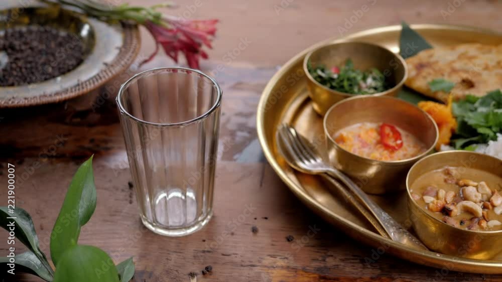 indian tea, masala tea, masala chai, herbal tea, spice tea with gujarati dahitra sweet pouring