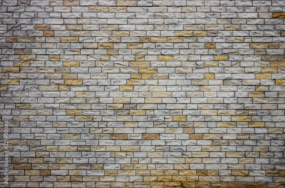 Brick wall made of natural stone bricks