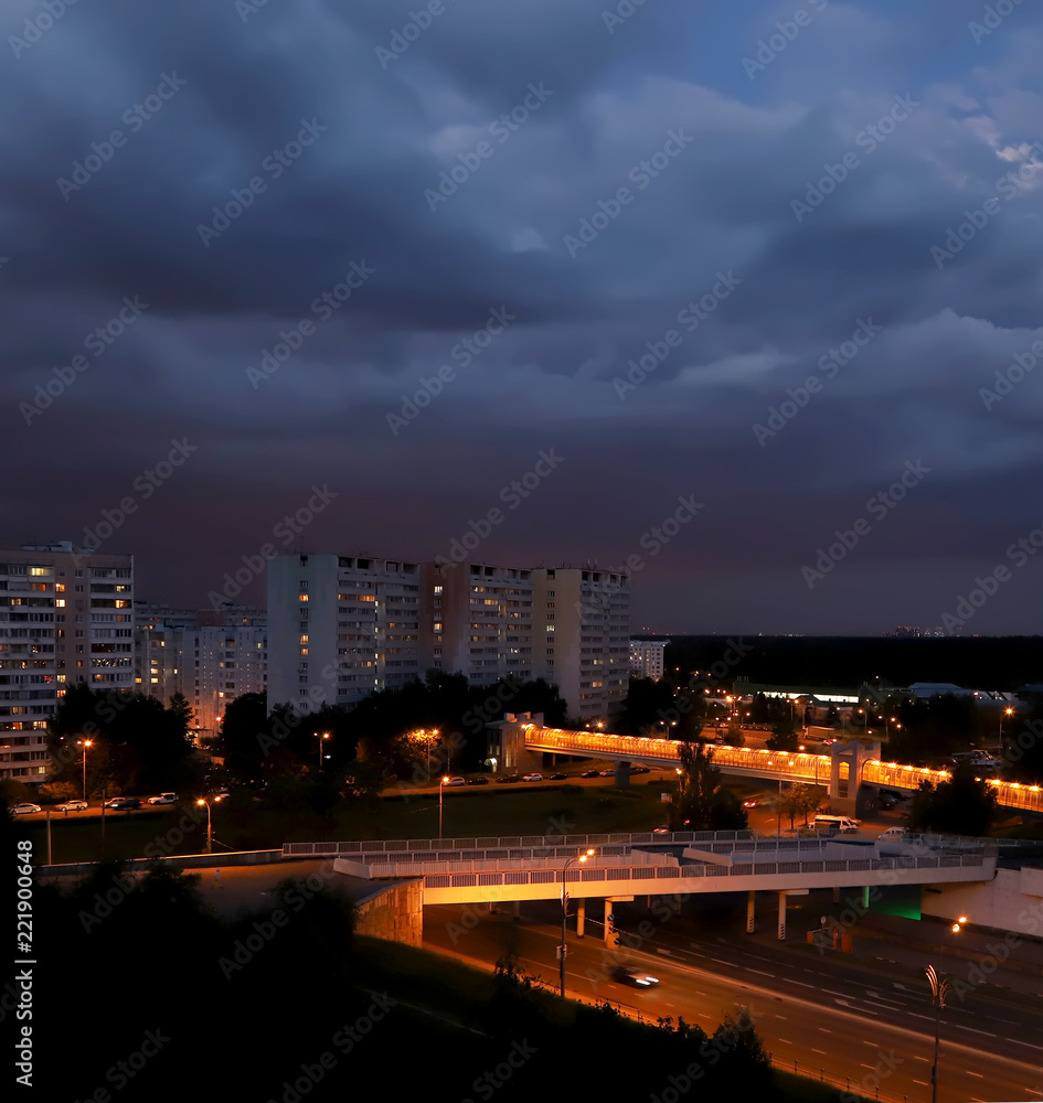 A stormy sky over the evening city