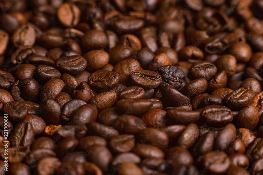 The texture of roasted coffee beans. Macro image The texture of roasted coffee beans. Macro image