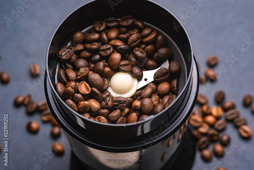 Coffee beans in a coffee grinder. The view from the top