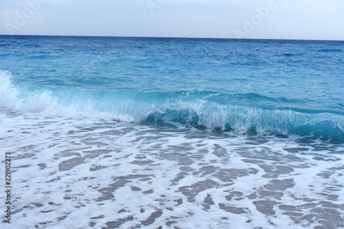 Blue sea, waves and sand. 