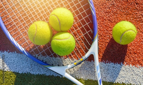 Tennis game. Tennis balls and rackets © BillionPhotos.com