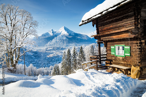 Traditional mountain cabin in the Alps in winter