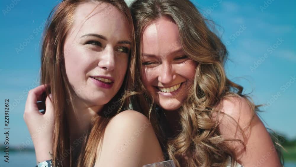 two blonde girls posing on a yacht two blonde girls posing on a yacht