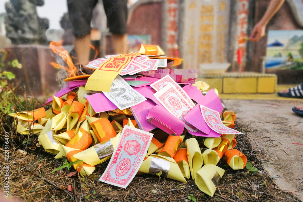 Burning paper money and other offerings during qingming in Malaysia