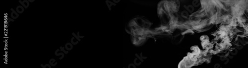 Fototapeta Naklejka Na Ścianę i Meble -  White smoke on a black background. Texture of smoke. Clubs of wh