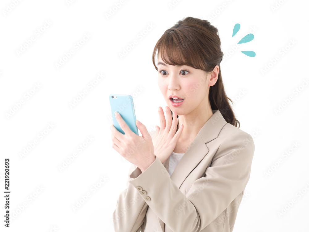 驚く・スマートフォン・女性 驚く・スマートフォン・女性