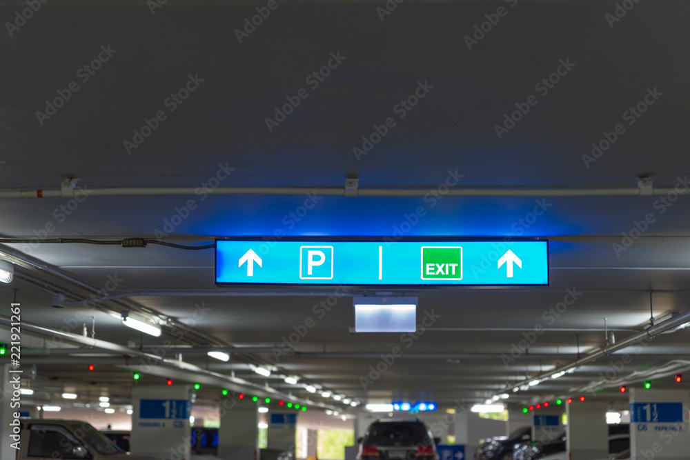 Board shows the direction transport for car parking in the shopping mall.