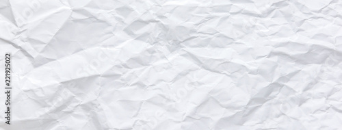 Ragged crumpled white paper texture banner background