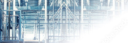 Faded blurred industrial  collage background with steel constructions, pipelines, supports, engineering lines. Industry, production site concept. Copy space for your design. Wide panoramic. Copy space