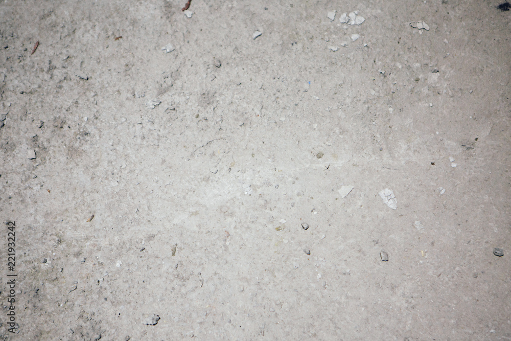 grey concrete or asphalt surface close-up as background grey concrete or asphalt surface close-up as background