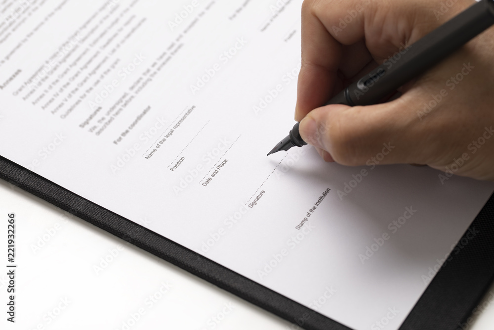 Businessman sign the signature on contract Businessman sign the signature on contract