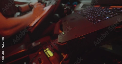 police officer working on notes next to computer 