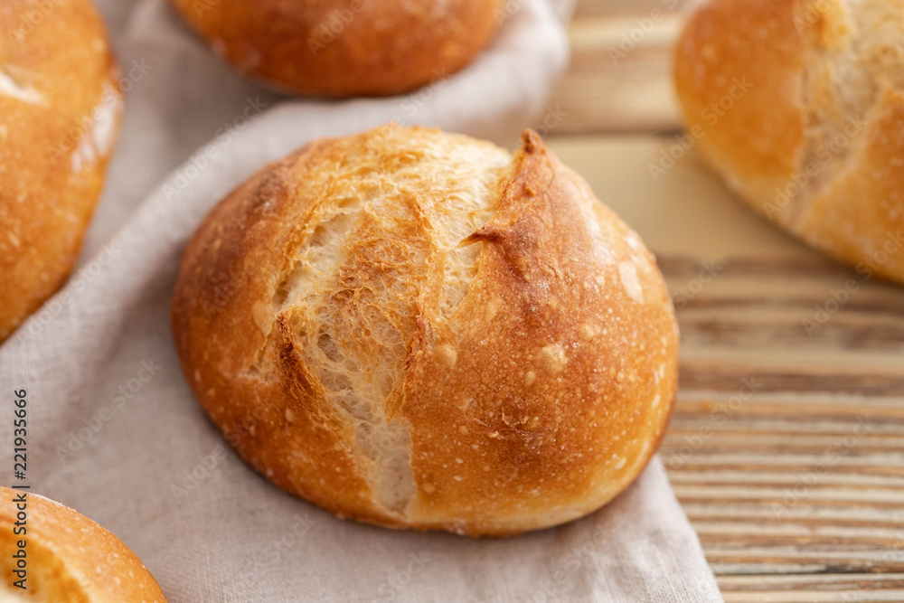 Freshly baked bread on dark gray kitchen table, copy space.