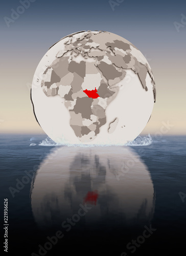 South Sudan on globe in water