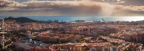 Fototapeta Naklejka Na Ścianę i Meble -  Dark clouds over the Malaga city