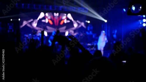 Wallpaper Mural Cheering crowd fan spectators enjoying a music raising swaying hands in lumiere Torontodigital.ca