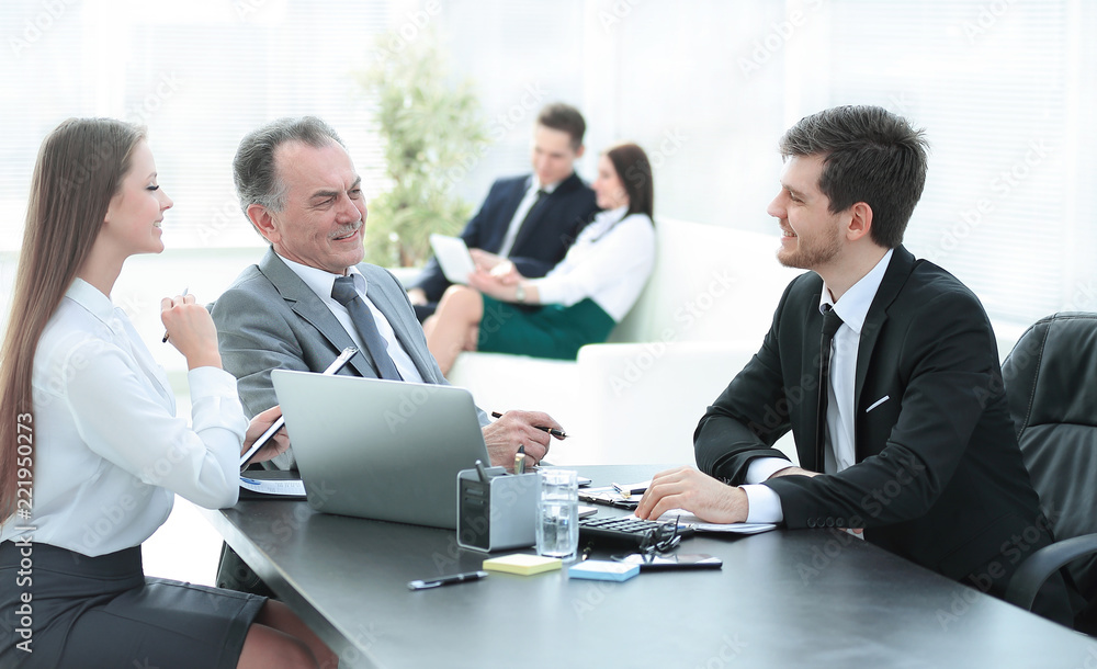 client talking with the staff at the Desk in the office client talking with the staff at the Desk in the office