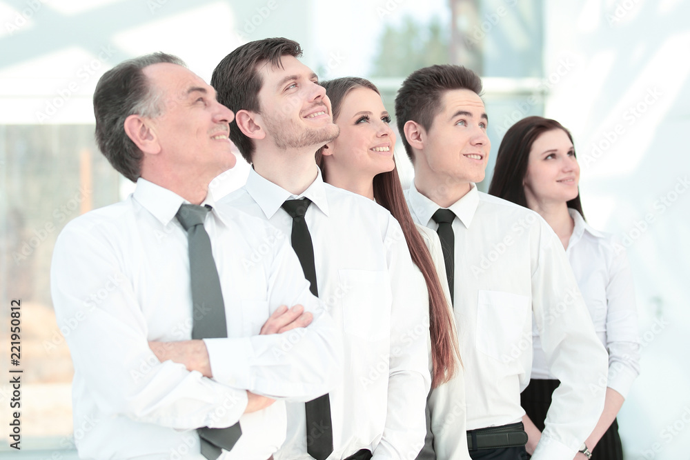 successful business team looking at copy space. successful business team looking at copy space.