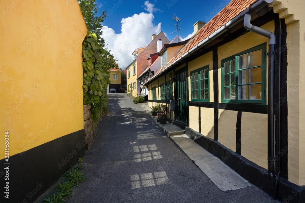 Traditional colorful half-timbered houses in Gudhjem, Bornholm, Denmark