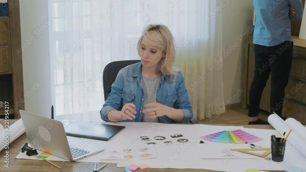 Female designer working on a project in the office