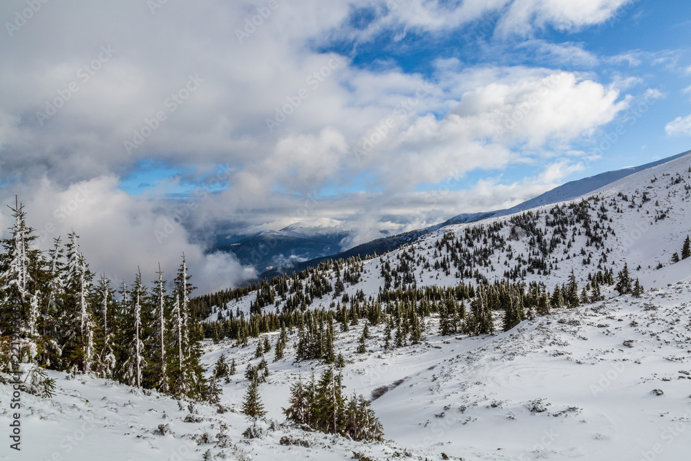 Winter landscape. Mountains in the snow Winter landscape. Mountains in the snow
