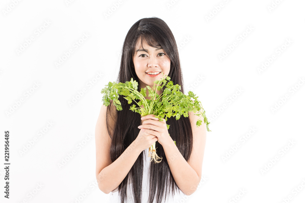 Beautiful Attractive Charming Asian Woman smile holding fresh coriander or Phakchi for good health,Isolated on white background,Healthy vegetable Beautiful Attractive Charming Asian Woman smile holding fresh coriander or Phakchi for good health,Isolated on white background,Healthy vegetable