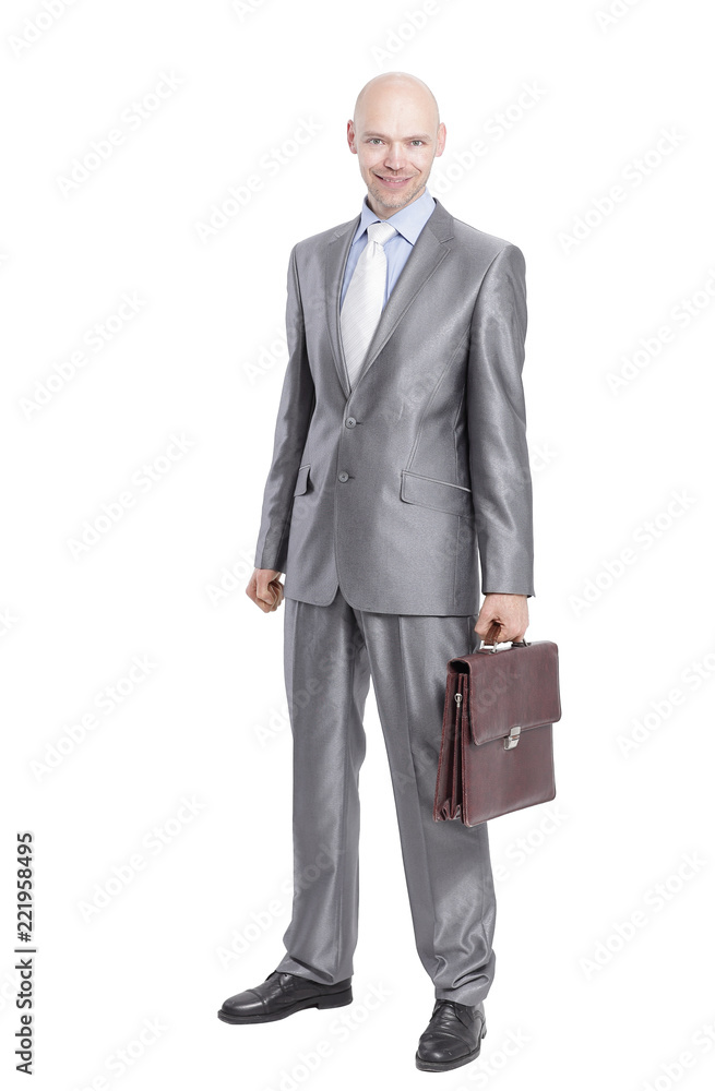 in full growth.handsome businessman with a leather briefcase.isolated on white. in full growth.handsome businessman with a leather briefcase.isolated on white.
