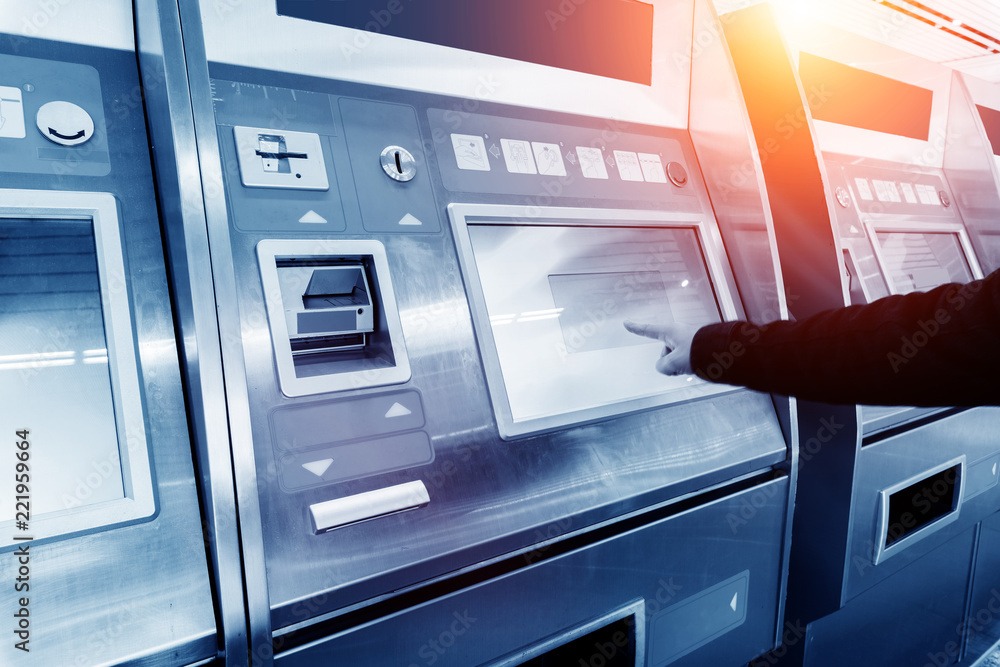 finance, money, bank and people concept - close up of hand entering pin code at atm machine finance, money, bank and people concept - close up of hand entering pin code at atm machine