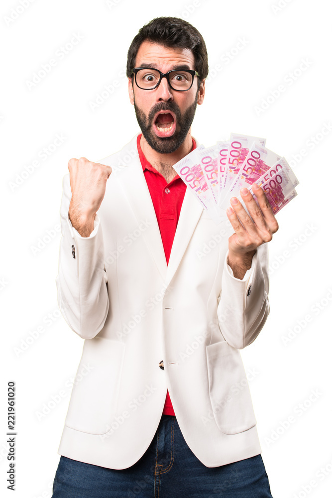Happy Brunette man with glasses taking a lot of money on white background Happy Brunette man with glasses taking a lot of money on white background