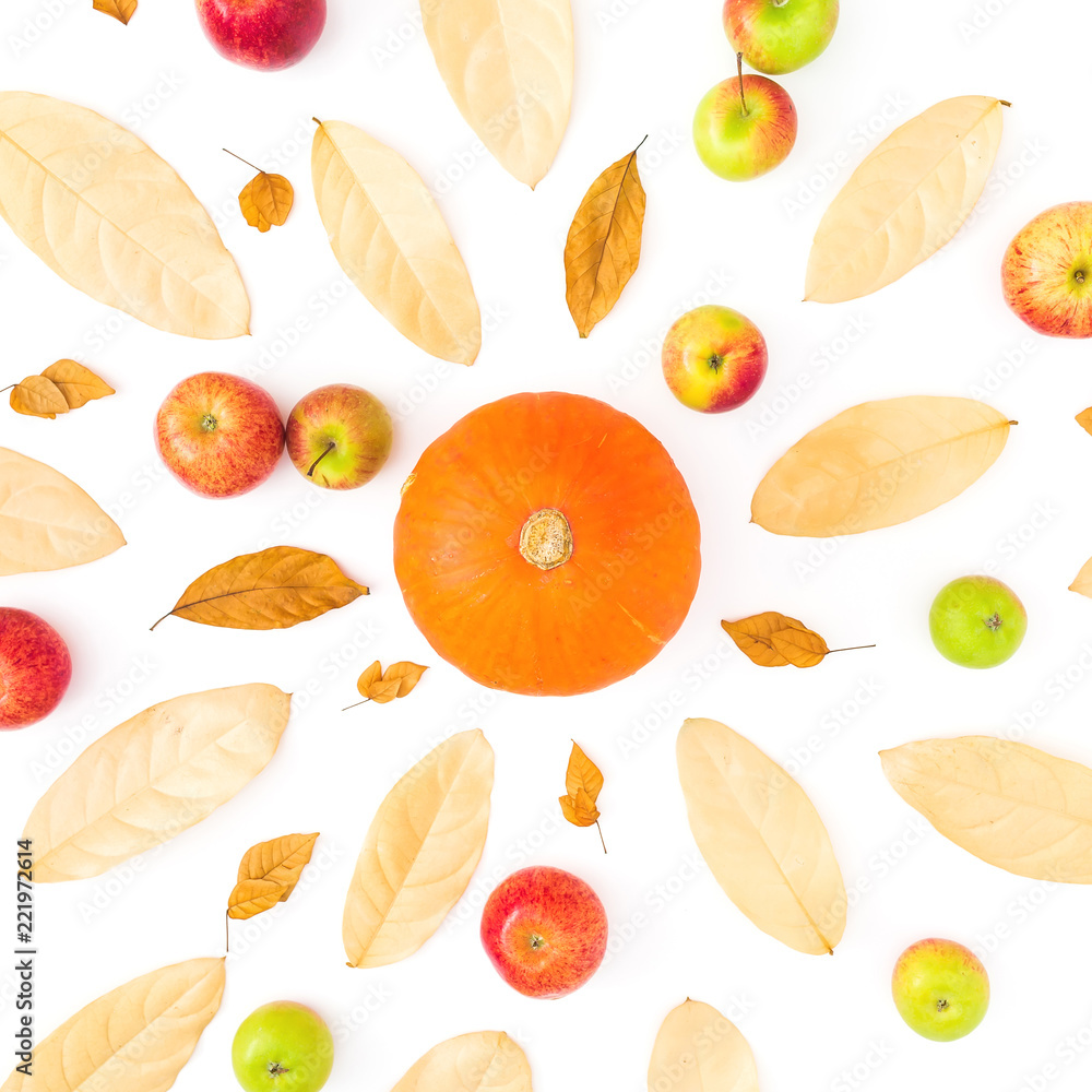 Autumn background with fall leaves, apples and pumpkin on white background. Flat lay, top view