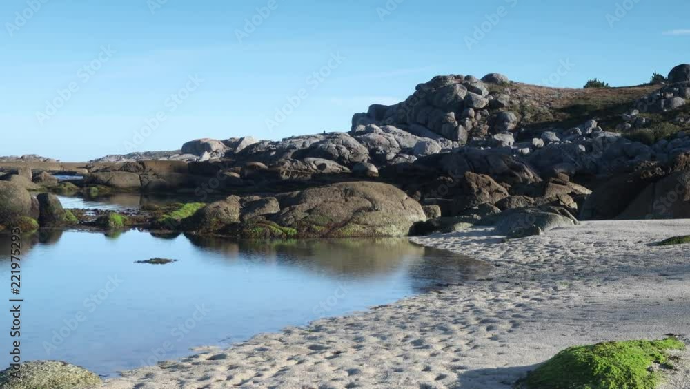 the beautiful beach playa lagos in the early morning on the coast of galicia in spain the beautiful beach playa lagos in the early morning on the coast of galicia in spain