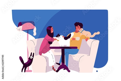 Happy young couple at cat cafe. Smiling man and woman sitting at table surrounded by cute adorable pet animals, watching them and fondling. Colorful vector illustration in flat cartoon style.