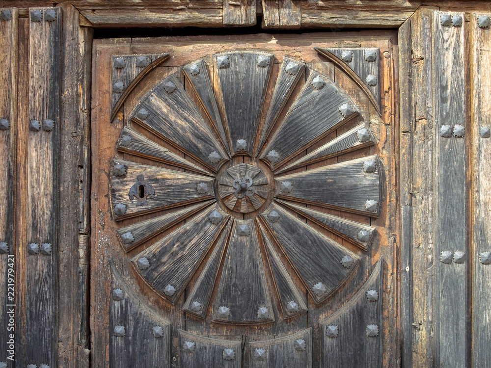 Details of the wooden door of the Church of Santa Maria - Boadilla del Camino, Castile and Leon, Spain