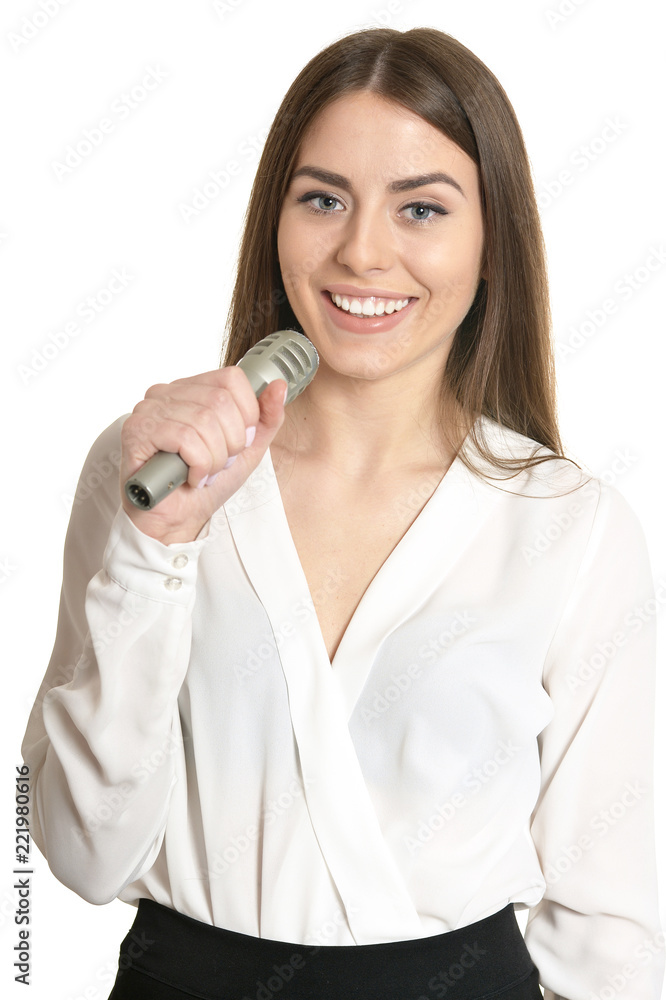 Young woman with microphone on white background Young woman with microphone on white background