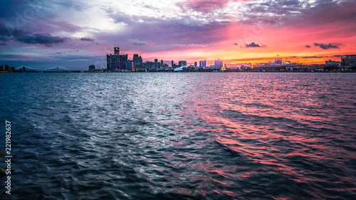 Sunset Over Detroit Michigan Skyline. Scenic sunset over the downtown waterfront cityscape of Detroit Michigan as seen from Sunset Point in Belle Isle State Park.